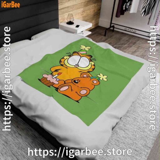 1 happy birthday garfield with small cake green blanket