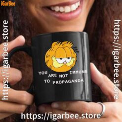 garfield you are not immune to propaganda black mug