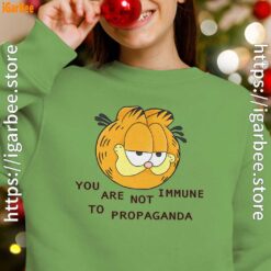 garfield you are not immune to propaganda green girl sweatshirt