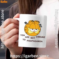 garfield you are not immune to propaganda white mug