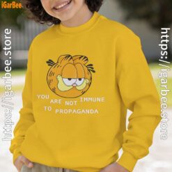 garfield you are not immune to propaganda yellow sweatshirt youth boy