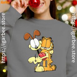 ripple junction garfield odie hugging youth girl with gray sweatshirt