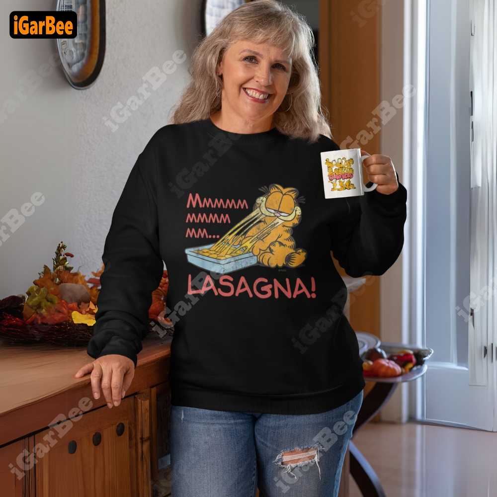 Black women's Garfield sweatshirt, size L, with a fun lasagna-eating Garfield print.