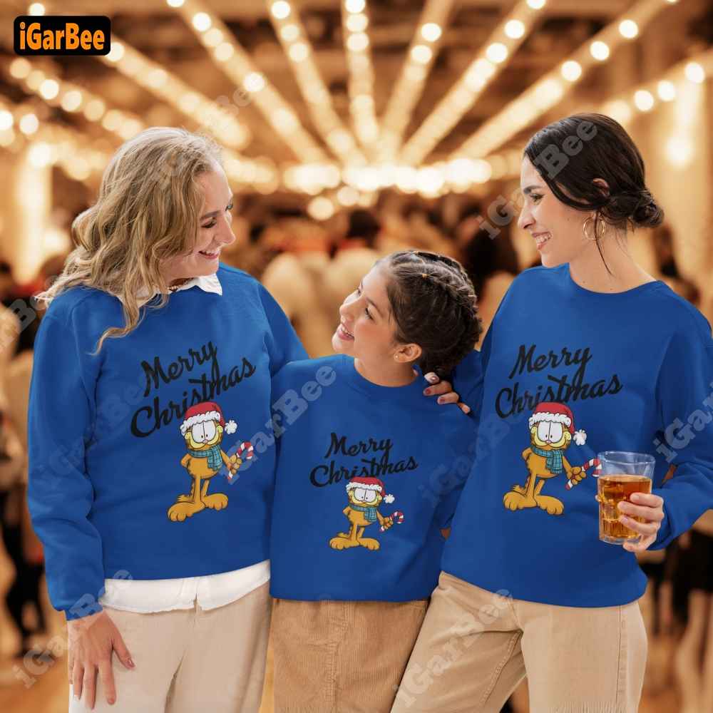 Little girl wearing a blue Garfield 'Merry Christmas' sweatshirt, size XL, reuniting with her mother and grandmother.