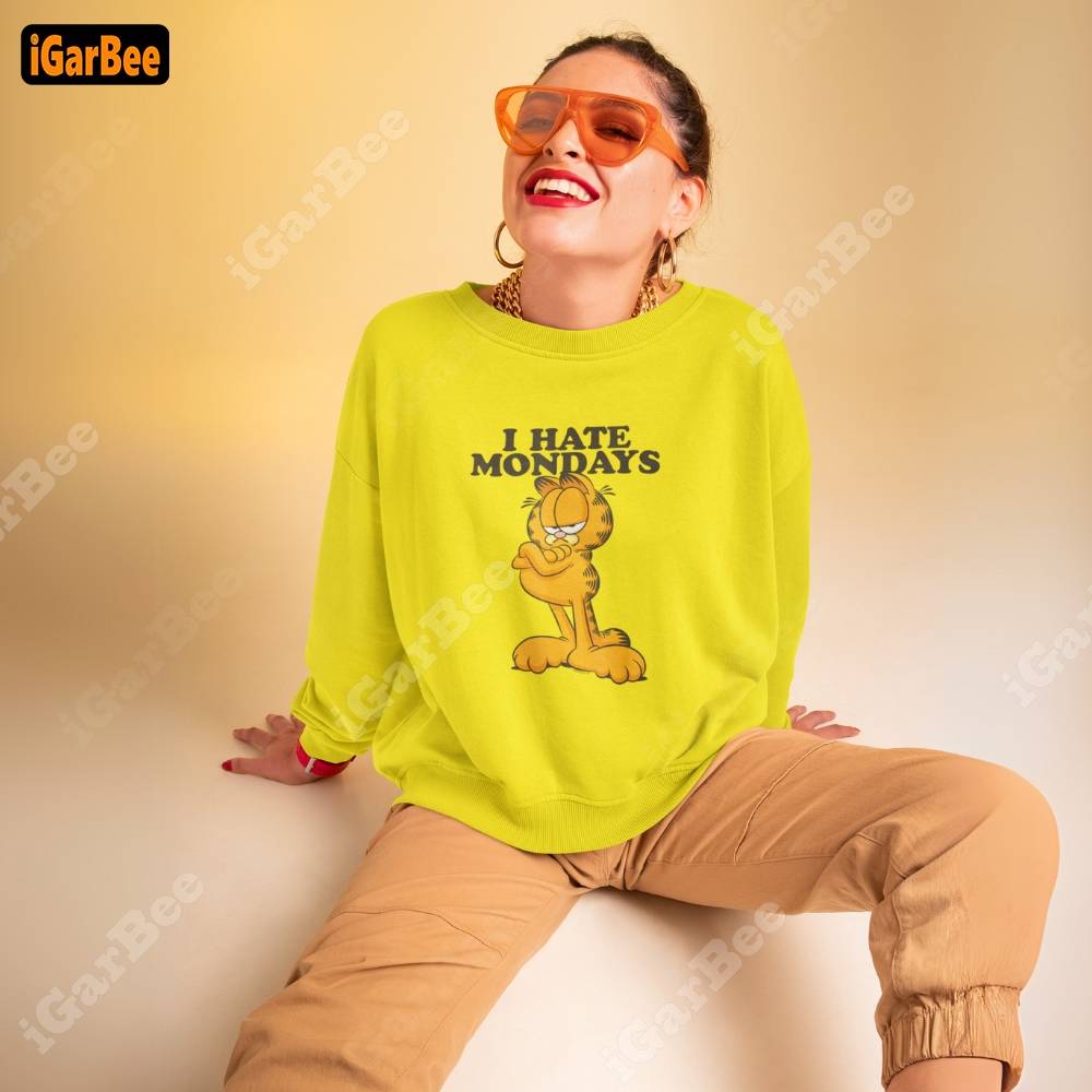 Cute Garfield sweatshirt for women, yellow, size M, with a fun 'I Hate Monday' graphic.