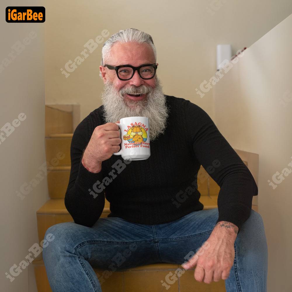 he laughed as he held a 15oz white garfield mug in his hand from igarbee White Garfield Mug 15oz: Great Father's Day Gifts