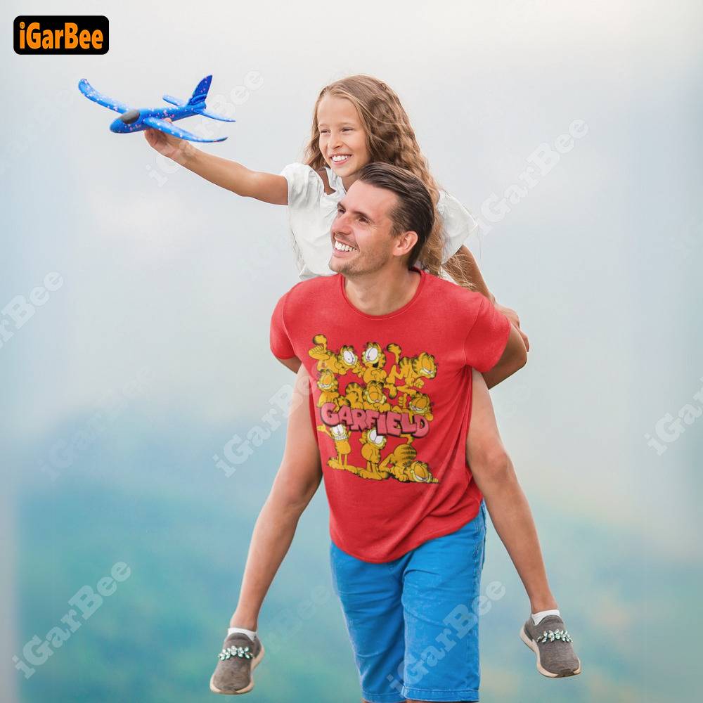 he was wearing a garfield t shirt and playing with his daughter, looking very happy Father's Day gift ideas with Garfield t shirt for men from iGarBee