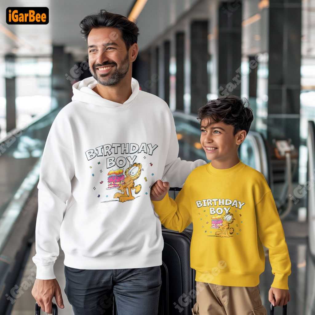 in his yellow garfield sweatshirt, the boy happily joined his dad on a birthday trip yellow Garfield sweatshirt for kids, best gift for son from dad